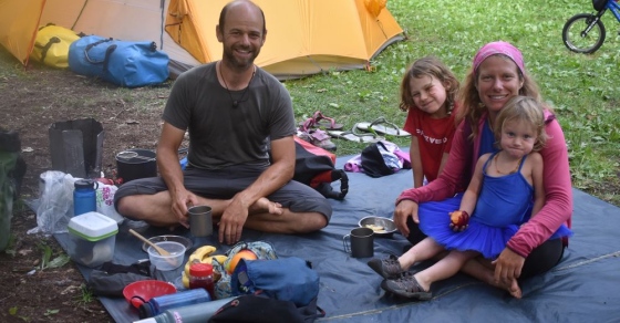 Family travelling around the world by bicycle camps at Madge Lake